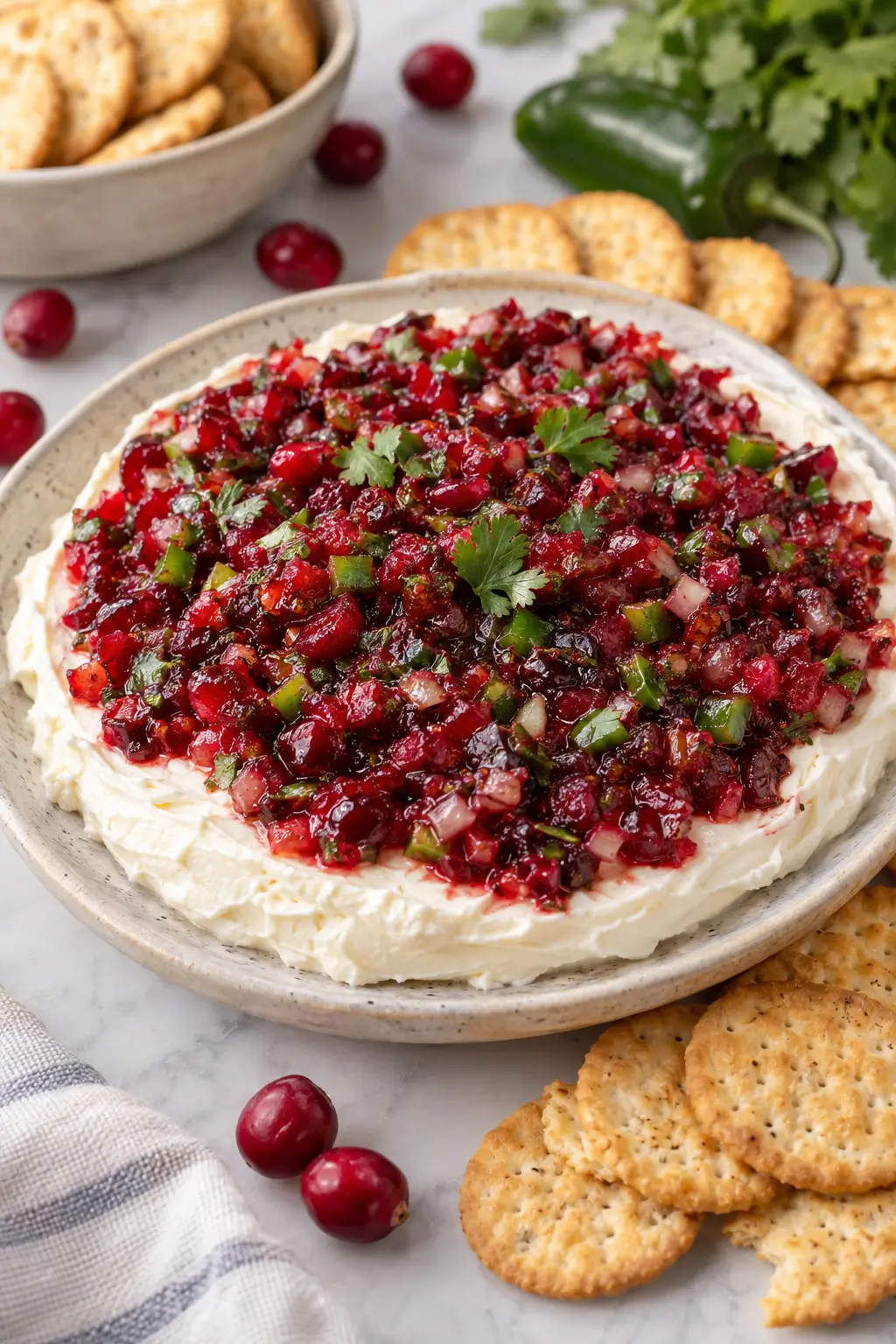 Make-Ahead Cranberry Jalapeno Cream Cheese Dip for Busy Hosts served and ready to enjoy